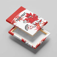Canvas wall art in red and white featuring Canada soccer mascot, soccer ball, and custom text