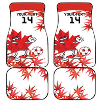 Set of four white car floor mats with red mascot, soccer ball, maple leaves, number 14