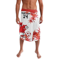 White Canada soccer swim shorts with red mascot graphic, soccer ball, and number 14