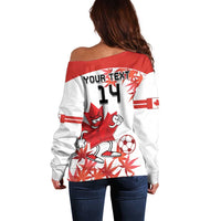 Women’s off-shoulder white sweater back with red “YOUR TEXT 14” soccer mascot graphic