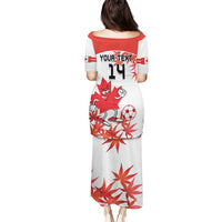 Women’s long soccer dress, white with red maple leaf, mascot and back number 14