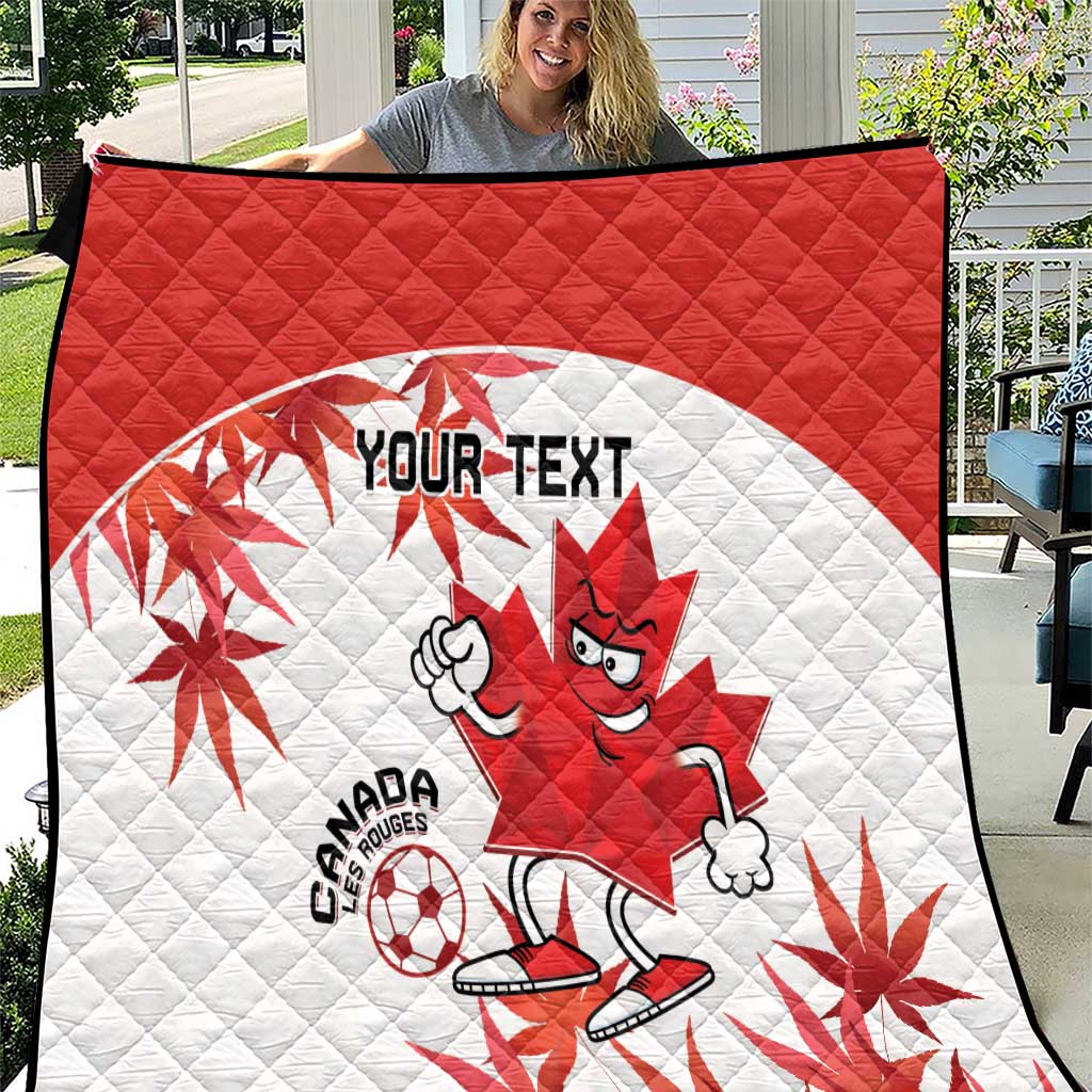 Red and white Canada-themed quilt with cartoon mascot, maple leaves, and “YOUR TEXT”