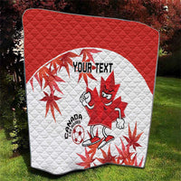 Canada red-and-white quilt with quilted diamonds, maple leaves, mascot, and “YOUR TEXT”