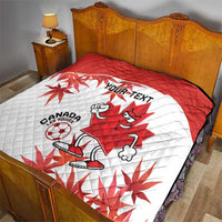 Red and white quilt on bed with cartoon Canada mascot, maple leaves, “YOUR TEXT”