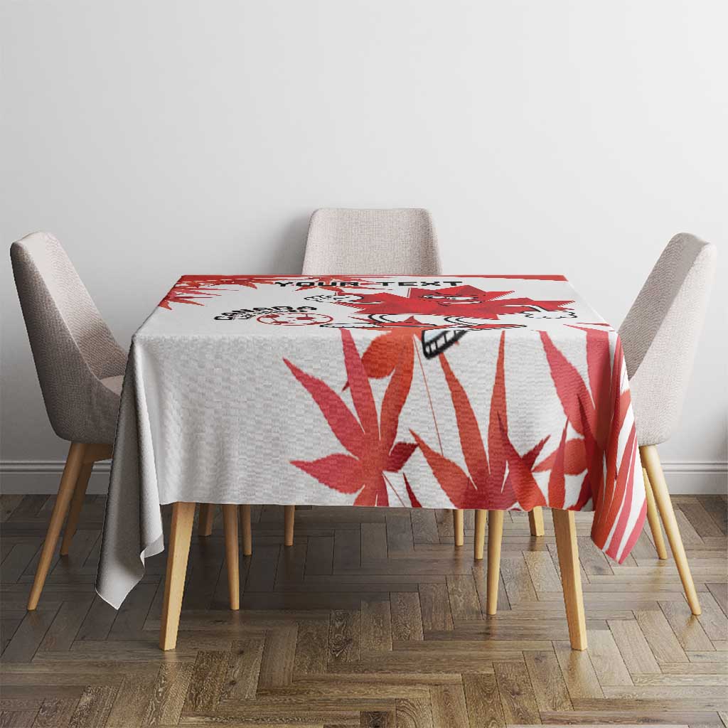 Red and white Canada soccer tablecloth with maple leaf motif on square table