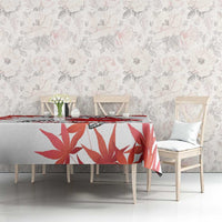 Red and white Canada soccer tablecloth with maple leaf motif on long table