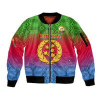 Gradient bomber jacket with full zip, ribbed cuffs, kente-style emblems in red, green, blue