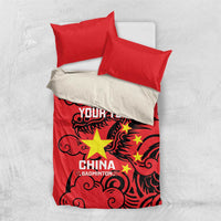 Red and white bedding set: red duvet with dragon stars plus two red pillowcases
