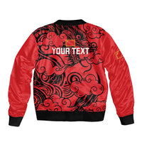 Red bomber jacket with black dragon cloud print, ribbed knit collar and cuffs