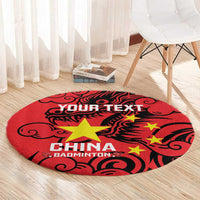 Red round China badminton rug with black swirls, “CHINA BADMINTON” text