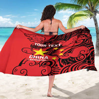 Red personalized badminton sarong with dragon design, bold star accents, and central text.