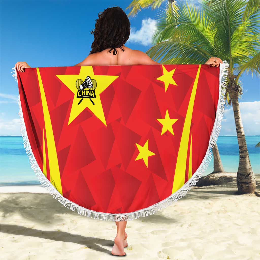 Personalised China badminton beach blanket, red circular design with fringe, held on beach