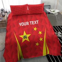 Red bedding set with China star emblem, yellow striped rays, and bold white text on duvet.