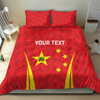 Red duvet and two pillowcases with triangle texture, China emblem, yellow fan stripes, and stars.