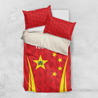 Red bedding set with China emblem, star graphics, and yellow striped corner details on top.