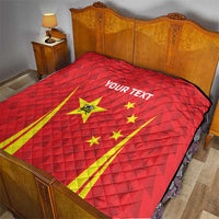 Red quilt with quilted texture, 'YOUR TEXT' and China flag badminton graphic on bed
