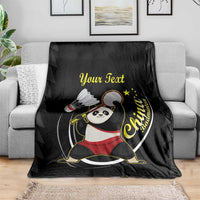 Black badminton blanket draped over sofa with panda tennis graphic and "Your Text"