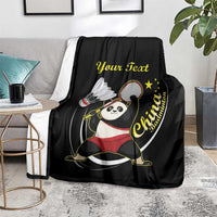 Black badminton blanket on floor with panda tennis graphic and "Your Text" gold print