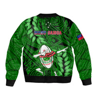 Green bomber jacket with ribbed trim, Manu Samoa text and rugby dabbing graphic