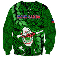 Unisex green rugby sweatshirt with MANU SAMOA back print, leaf pattern, and small flag patch