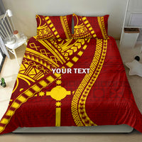 Maroon tapa-pattern bedding set with gold accents and 'YOUR TEXT' on duvet