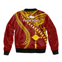Maroon bomber jacket back view with yellow tapa-style design and custom text area