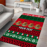 Red and green Mexican area rug with 'YOUR TEXT' text band and holiday motifs