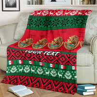 Red Christmas blanket with green stripe bands, reindeer and medallion graphics, custom text