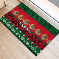 Red and green Christmas doormat with ornate icons, borders, and 'YOUR TEXT'.
