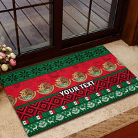 Red and green Christmas doormat with festive icons, trim stripes, and 'YOUR TEXT'.