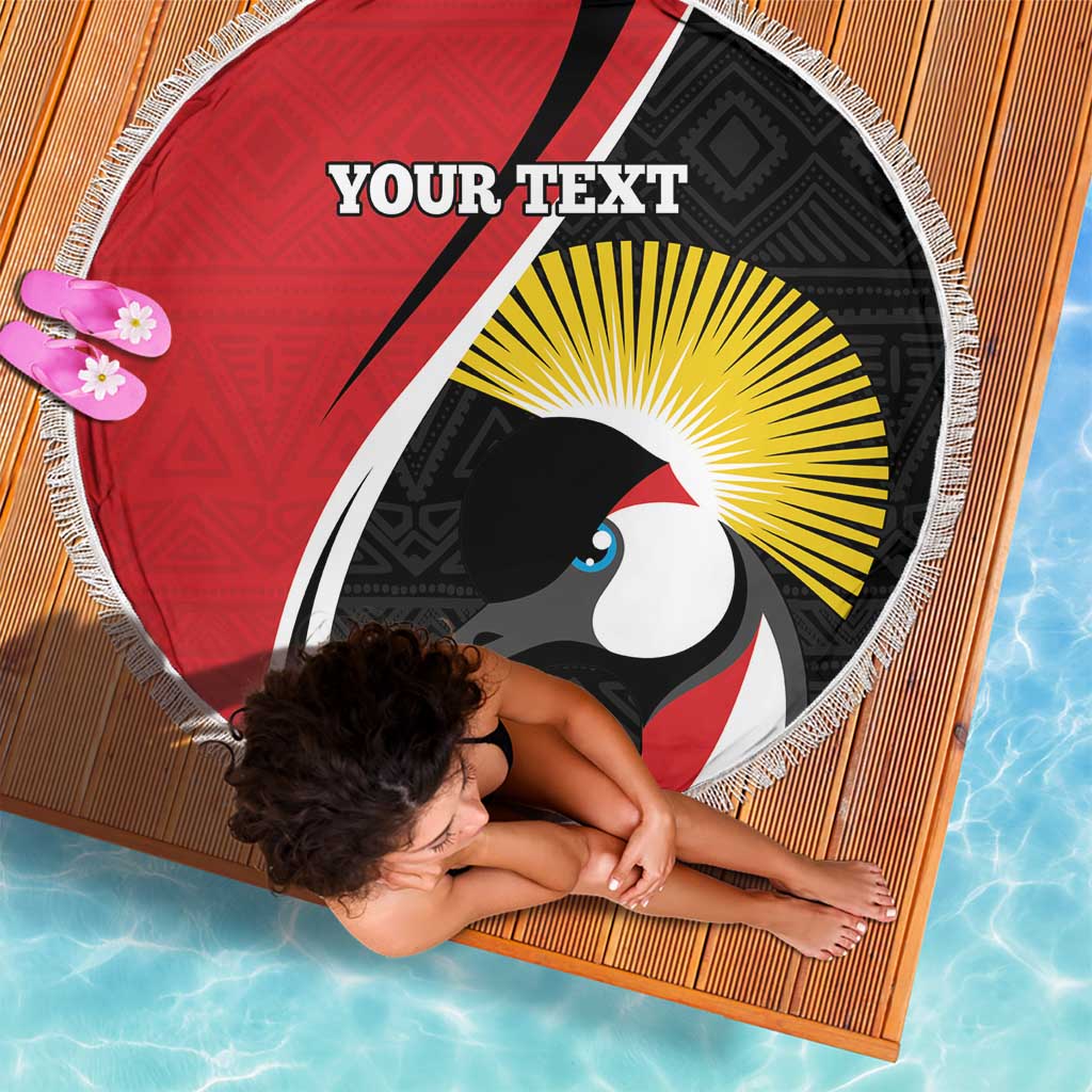 Round beach blanket with toucan graphic, red and black panels, white fringe edging