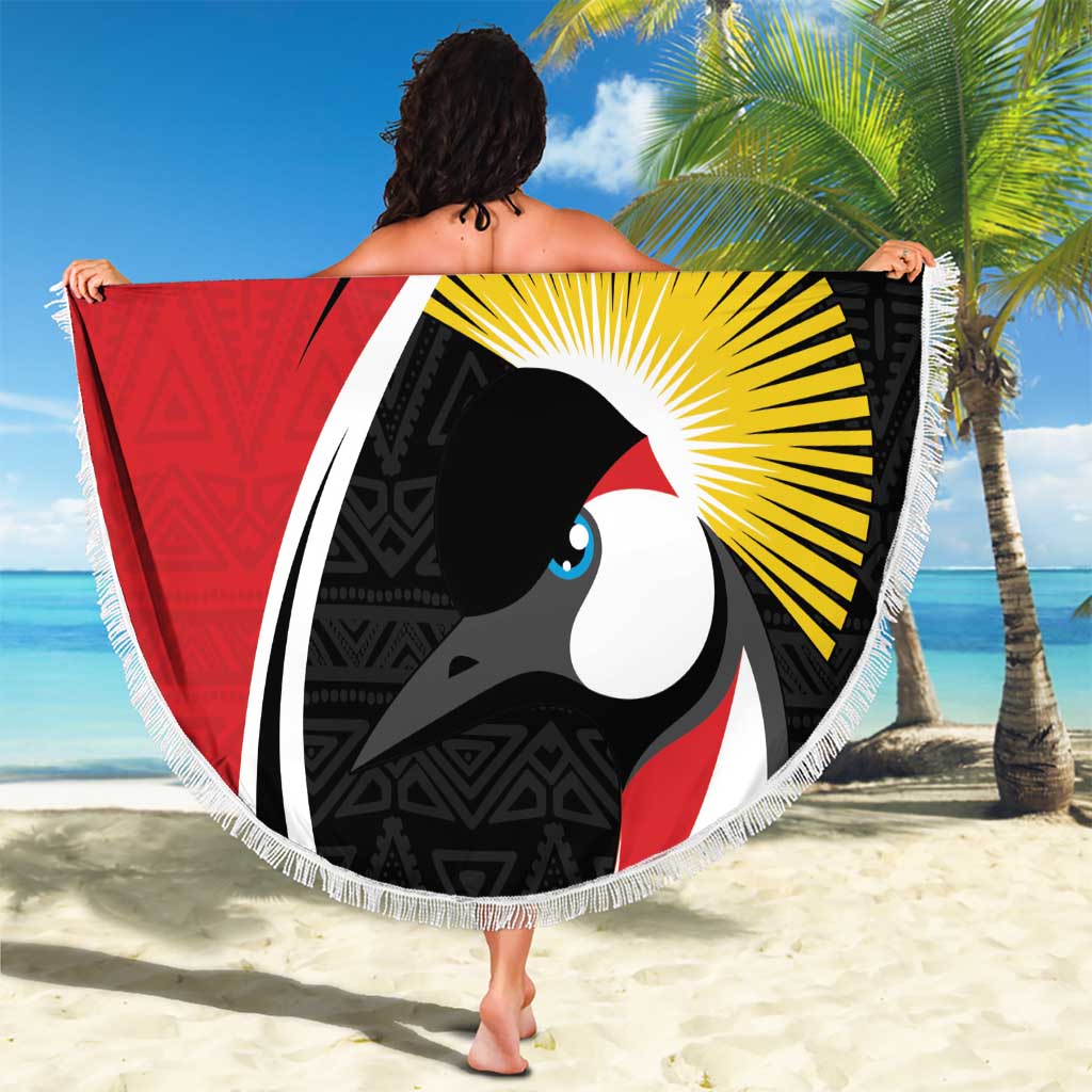 Red and black round beach blanket with toucan face graphic and white fringe border