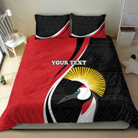 Red and black rugby bedding set featuring a penguin graphic and tribal trim