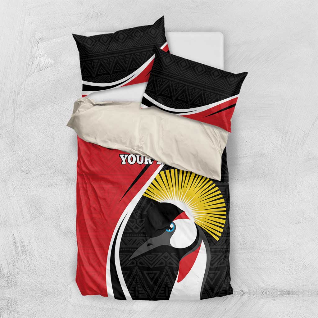 Red and black bedding set with penguin face artwork and patterned pillowcases