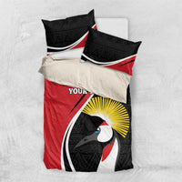 Red and black bedding set with penguin face artwork and patterned pillowcases