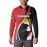 Red and black rugby button sweatshirt on model with crane sunburst chest print and collar