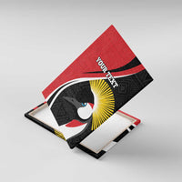 Framed red canvas wall art with black geometric pattern, penguin motif and custom text