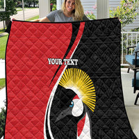 Custom quilt with red and black panels and crane emblem, “YOUR TEXT” center