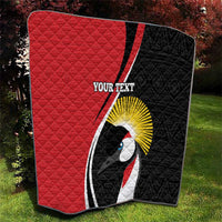 Quilt blanket in red and black with crane design, “YOUR TEXT” text detail