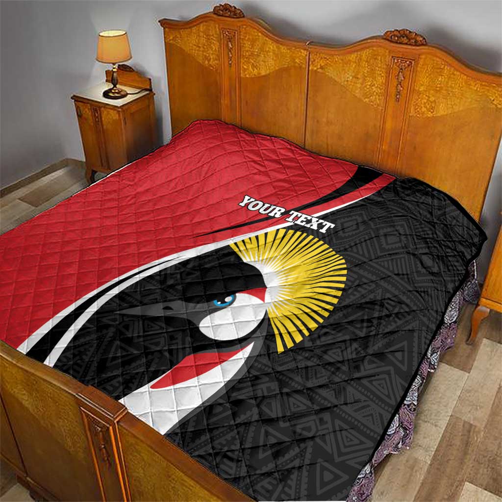Red and black bed quilt with crane emblem and “YOUR TEXT” print on cover