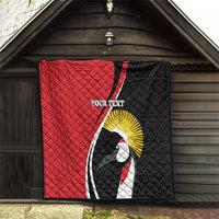 Red and black quilt with crane emblem, “YOUR TEXT” label, diamond quilt stitching