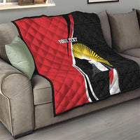 Decorative red and black quilt with crane artwork and “YOUR TEXT” on couch