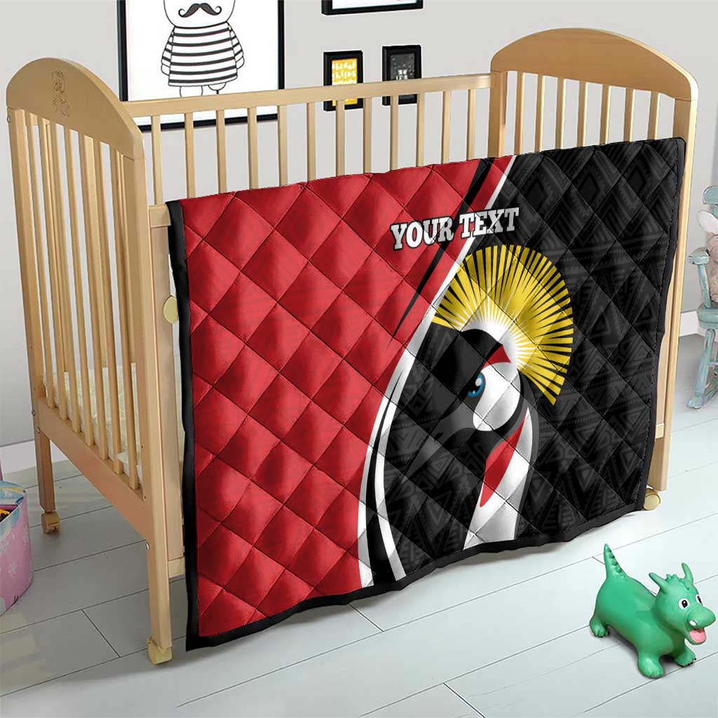 Crib quilt in red and black with crane emblem, sunburst, and “YOUR TEXT”