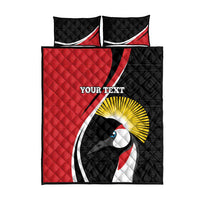 Quilt bed set with two pillows and duvet showing bird emblem over red and black