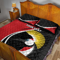 Red and black quilt bed set with fan rugby-style bird graphic and two pillows