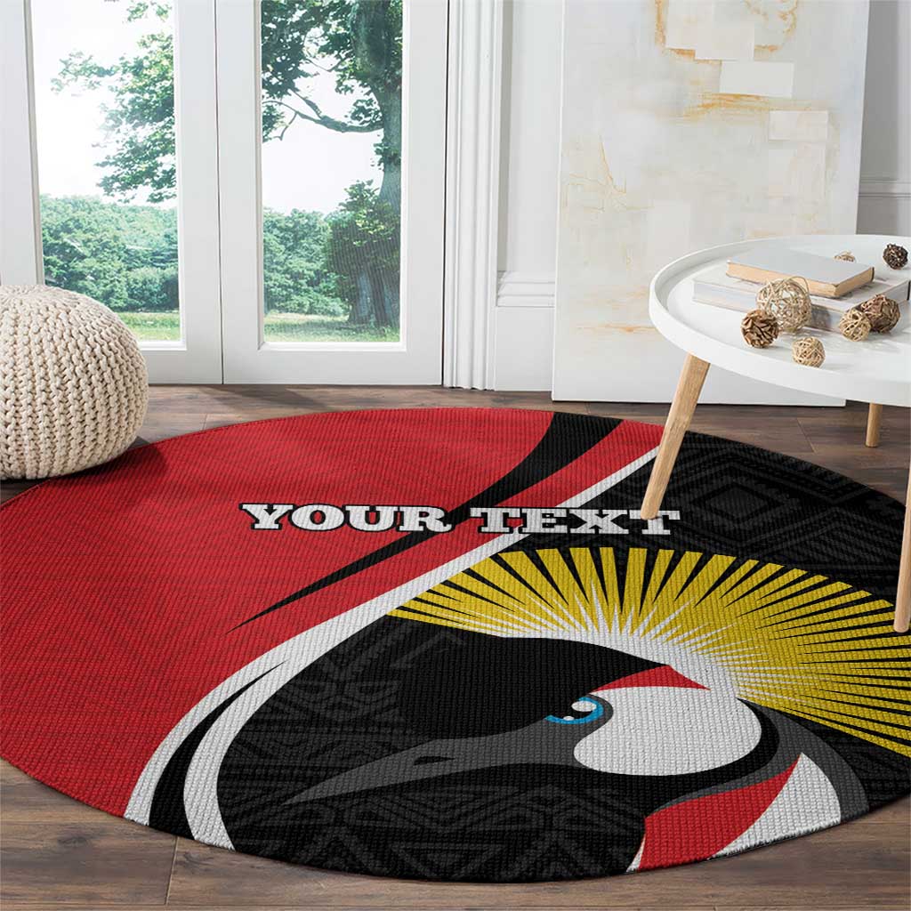 Round red rug with large bird head graphic, yellow sunburst, and 'YOUR TEXT' text