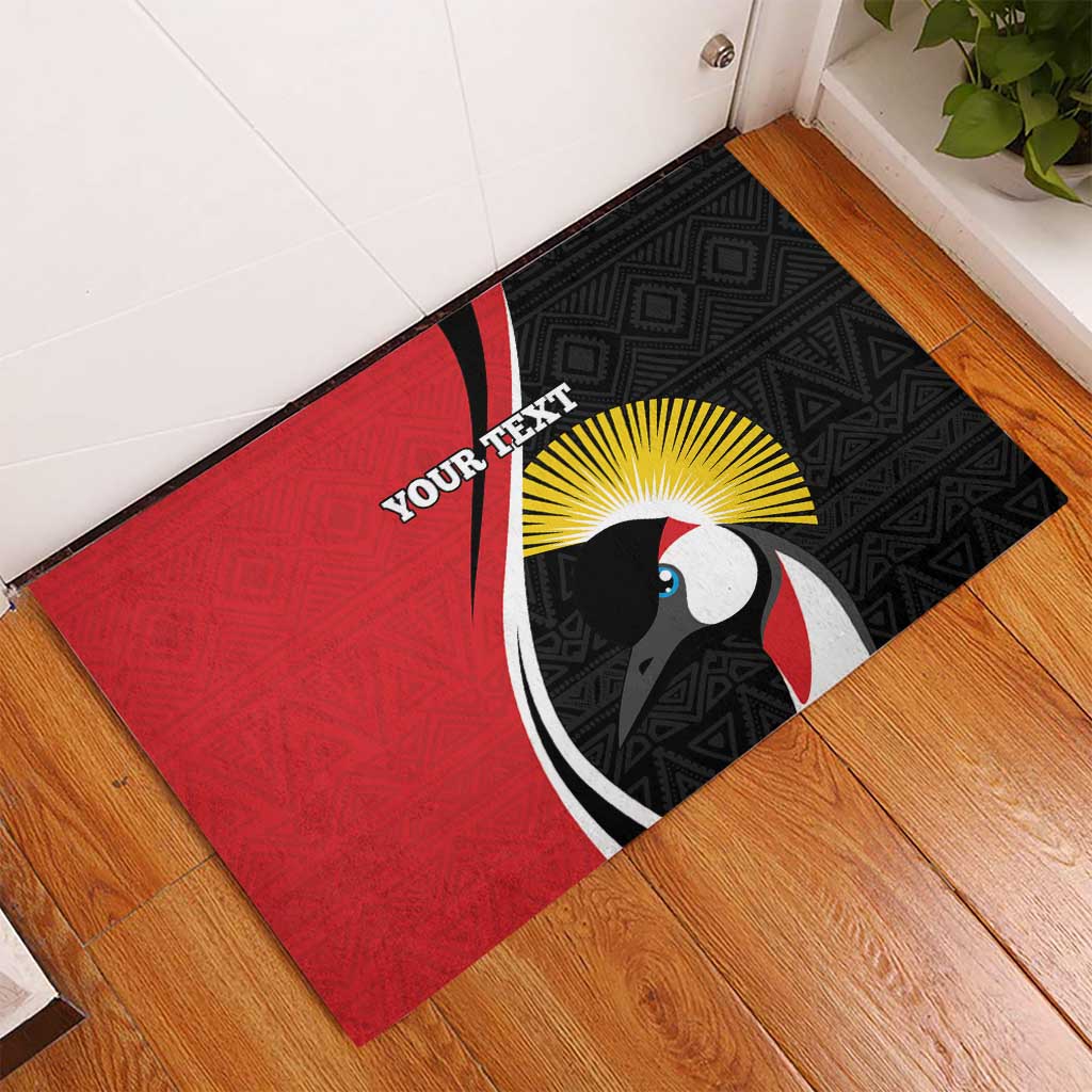 Red and black rubber doormat with bird emblem, geometric pattern, and YOUR TEXT