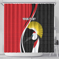 Red and black shower curtain with penguin graphic, sunburst halo, and customizable text