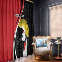 Red and black African-pattern window curtain panels with toucan graphic; draped look