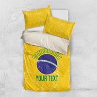 Yellow bedding set with Brazil emblem on duvet cover and 2 matching pillowcases